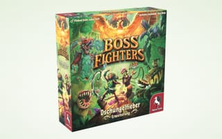 3D-Schachtel der Erweiterung „Boss Fighters QR: Dschungelfieber“ vor hellem Hintergrund, mit Dschungelmotiv, Helden und Bossmonstern